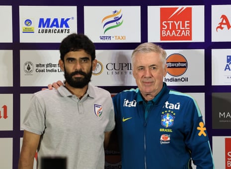 Carlo Ancelotti (right) with India's head coach Khalid Jamil.
