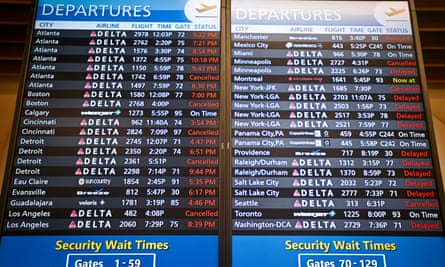 An image of a flight status board in Orlando, Florida.