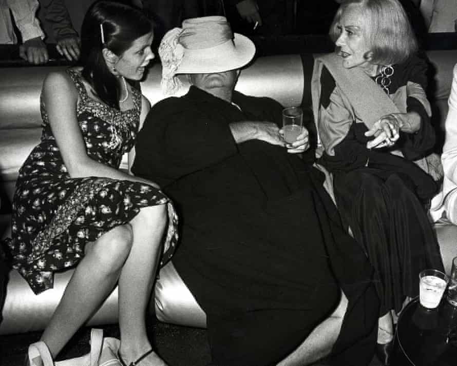 ‘Adoptive daughter’ … Kate Harrington, left, with Capote and Gloria Swanson.