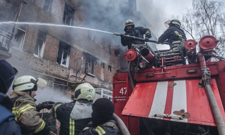Firefighters at the scene in Bakhmut, Ukraine.