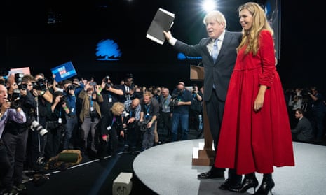 Boris Johnson joined by his wife Carrie on stage after delivering his keynote speech at the Conservative conference.