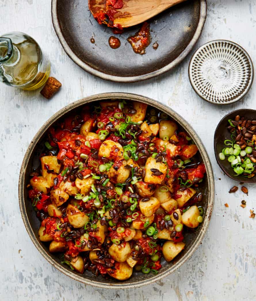 Yotam Ottolenghi’s potato salad with charred tomato and orange salsa.