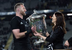 New Zealand captain Kieran Read receives the Bledisloe Cup from Ardern after the rugby team’s 2018 victory against Australia