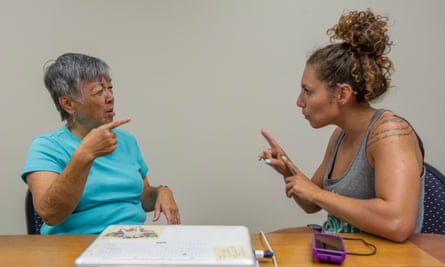 Linda Lambrecht, left, teaches Hawaii Sign Language.