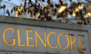 FILE PHOTO: The logo of commodities trader Glencore is pictured in front of the company’s headquarters in Baar, Switzerland, November 20, 2012. REUTERS/Arnd Wiegmann/File Photo
