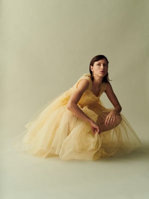 Tulle dress by Molly Goddard. Hoop earrings with pearls by Pacharee