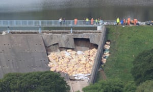 Emergency repairs to the damaged dam.