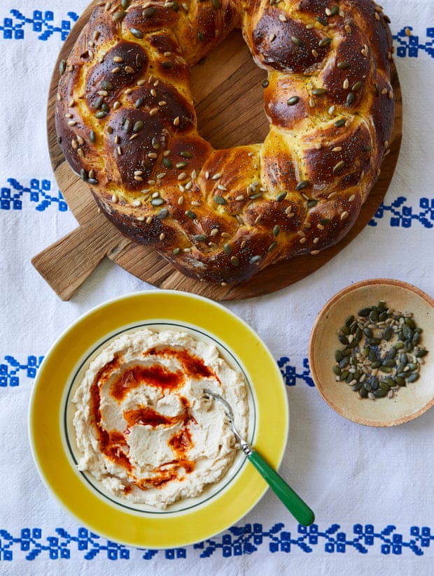 Olia Hercules’ butterbean dip and pumpkin and orange kolach bread above it.