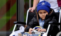 Ashya King leaves after finishing his treatment at the Proton Therapy Centre in Prague<br>Ashya King, a 5-year-old British boy with brain tumor, leaves after finishing his treatment at the Proton Therapy Centre in Prague October 24, 2014. King had his first treatment on September 15 after his parents, Naghemeh and Brett King, attracted international attention by removing him from hospital in Britain against medical advice. The couple left Britain with their son at the end of August, saying they wanted to take him to the clinic in Prague as proton beam therapy is not currently available in Britain. King's parents were detained in Spain after an international manhunt that drew condemnation from the British media, separated from their sick son and then released days later by a Spanish judge. REUTERS/Rene Volfik (CZECH REPUBLIC - Tags: HEALTH POLITICS TPX IMAGES OF THE DAY)