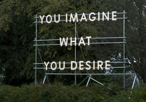 The You Imagine What You Desire sculpture by artist Nathan Coley borrows a quote from George Bernard Shaw