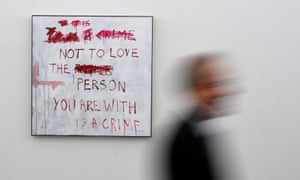A visitor walks past No Love at the launch of A Fortnight of Tears.