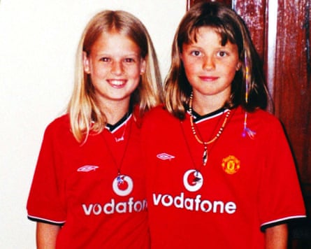 Holly and Jessica wearing Manchester United shirts