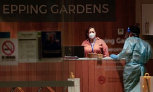 Staff members are seen inside the Epping Gardens Aged Care Facility in Melbourne, Australia.