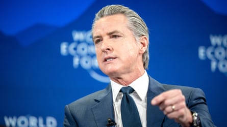 Gavin Newsom on stage at Davos