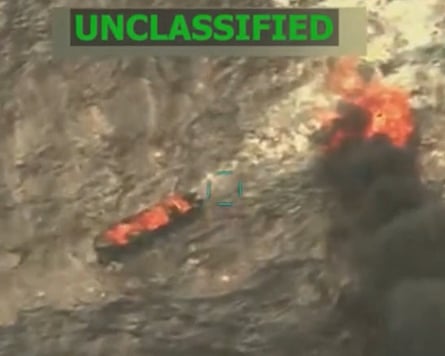 A screen grab posted by Donald Trump shows an earlier US airstrike on an alleged drug boat in the Caribbean.