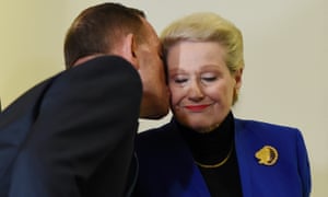 Tony Abbott gives Bronwyn Bishop a kiss after a party room meeting to elect her replacement as Speaker in august 2015.