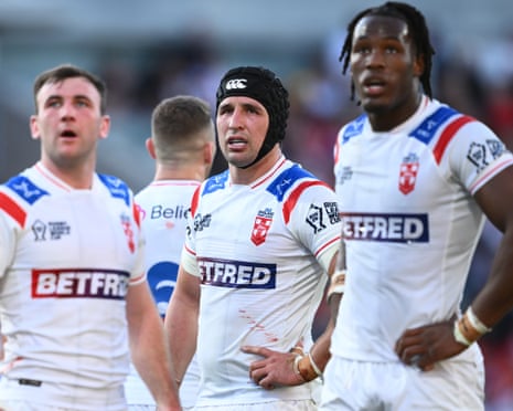EnglandâÂÂs Victor Radley, flanked by his England teammates, registers the shock of defeat by Tonga