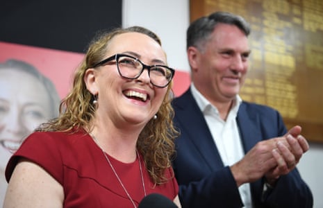 Mary Doyle speaks to party faithful after claiming victory in the Aston byelection as deputy prime minister Richard Marles looks on