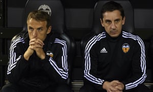 Gary Neville, right, and his brother Phil saw Valencia win the Copa del Rey second leg 2-0 against Barkaldo to go through 5-1 on aggregate.