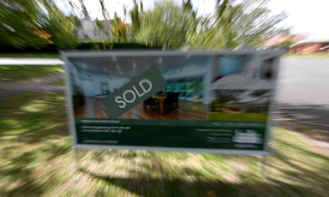 A real estate advertising board with a Sold sign in Canberra, April 4, 2017.