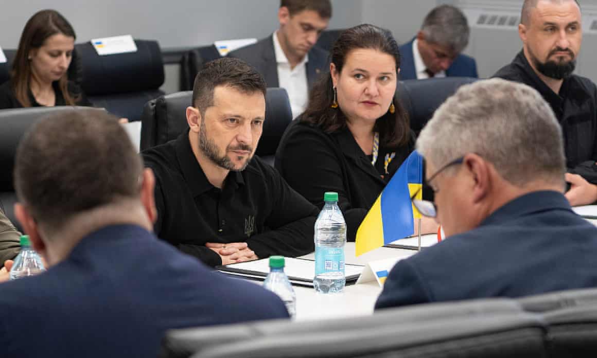 Ukrainian President Volodymyr Zelenskyy, center, visiting the Scranton Army Ammunition Plant in Scranton, Pennsylvania