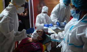 A resident having a Covid swab in Mumbai