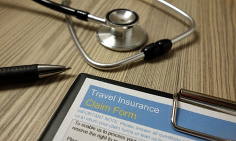 A stethoscope beside a travel insurance claim form