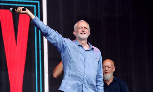 Negative mainstream media coverage of Jeremy Corbyn, pictured at Glastonbury, fuels the opposition of the Canary and Skwawkbox.