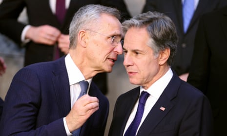 Nato secretary general Jens Stoltenberg, left, speaks with United States secretary of state Antony Blinken during a group photo of Nato foreign ministers at Nato headquarters in Brussels.