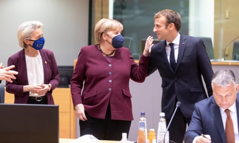 Ursula von der Leyen looks on as Angela Merkel speaks to the French president, Emmanuel Macron, at EU summit