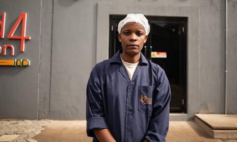 Franklin Mutethia at the kitchen. His main job is inspecting the food delivery pots and ensuring they are destined for the right schools.