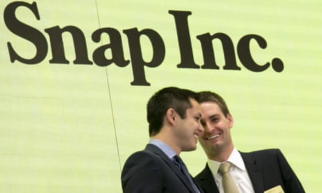 Snapchat co-founders Bobby Murphy, left, and chief executive Evan Spiegel ring the opening bell at the New York Stock Exchange as the company celebrates its flotation.