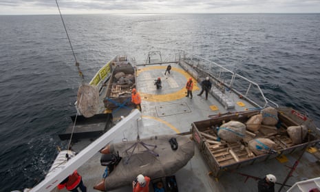 Boulders being lowered into the Dogger Bank MPA from the Greenpeace ship, Esperanza.