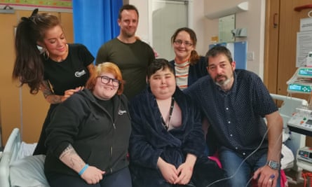 Sally Morgan-Moore and Paige Harvey from Frontier Developments, left, visit Michael and family in Addenbrooke’s hospital. Pictures reproduced with permission.