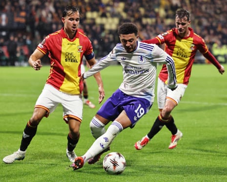 Jadon Sancho tries to wriggle out of a tight space at Go Ahead Eagles.