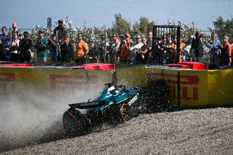 Aston Martin's Canadian driver Lance Stroll misses a turn and spins into the barriers