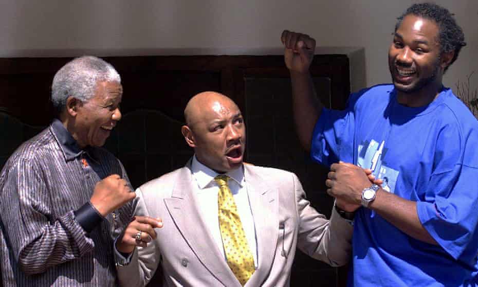 Marvin Hagler (centre) strikes a pose with Nelson Mandela and Lennox Lewis in 2001.