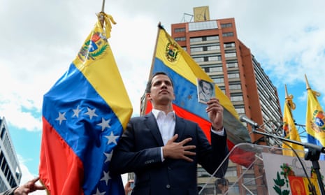 Juan Guaidó declares himself the country’s ‘acting president’ during a rally on Wednesday.