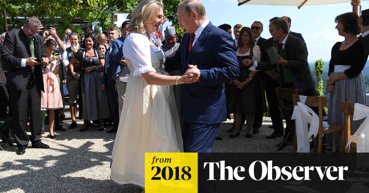 Cossacks And Flowers As Putin Leads Austrian Wedding Dance World