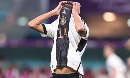 Jamal Musiala looks dejected during Germany’s defeat by Japan.