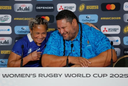 Samoa captain Sui Pauaraisa and coach Ramsay Tomokino in tears during the post-match press conference.