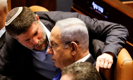 Bezalel Smotrich, left, speaks to Netanyahu in parliament last year