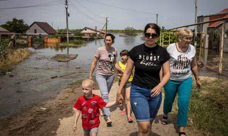 ‘They hate us so much’: villagers flee flooding after dam attack