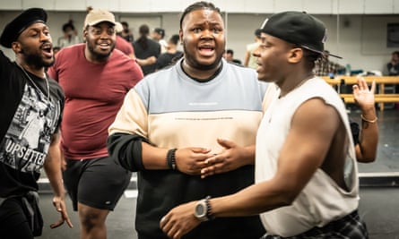 ‘I think the story transcends its American original’ … Kyle Ramar Freeman, centre, rehearses the part of Usher with the cast for the UK production.