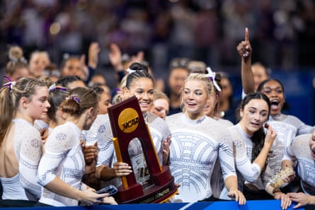 Olivia Dunne poses with her LSU teammates after the Tigers’ national championship win in April 2024.