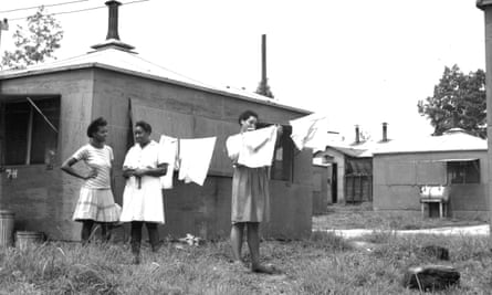 African American women hanging laundry in a hutment area, Oak Ridge, 1945. Despite their often forward-looking design and planning, the three Secret Cities of the Manhattan Project treated racial segregation as a given.