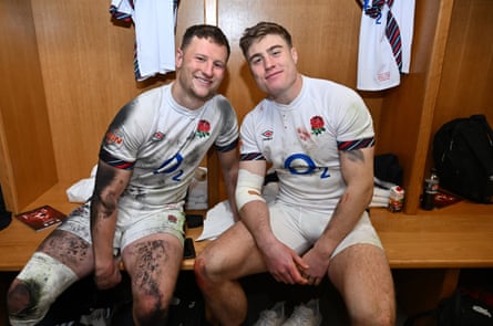Fraser Dingwall of England (left) poses for a photograph with teammate Tommy Freeman as they celebrate in the England dressing room after the 2025 Six Nations 2025 victory over Wales.