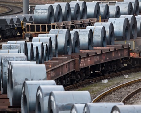 Steel coils stored on trains in front of the ThyssenKrupp steel mill