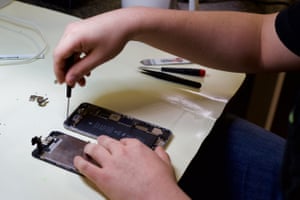 One of iFixOmaha’s technicians treating a water-damaged iPhone 6.