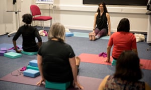 Kingston hospital in south London offers staff yoga classes to improve their wellbeing. 